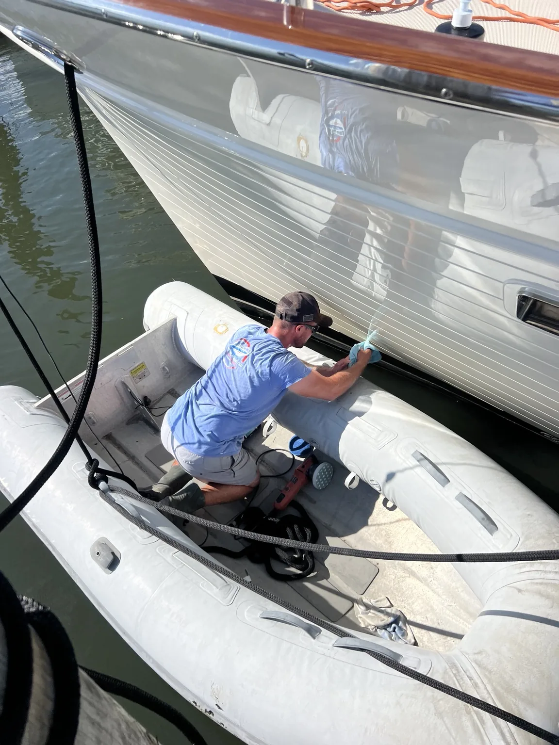 In-water hull polishing from a tender