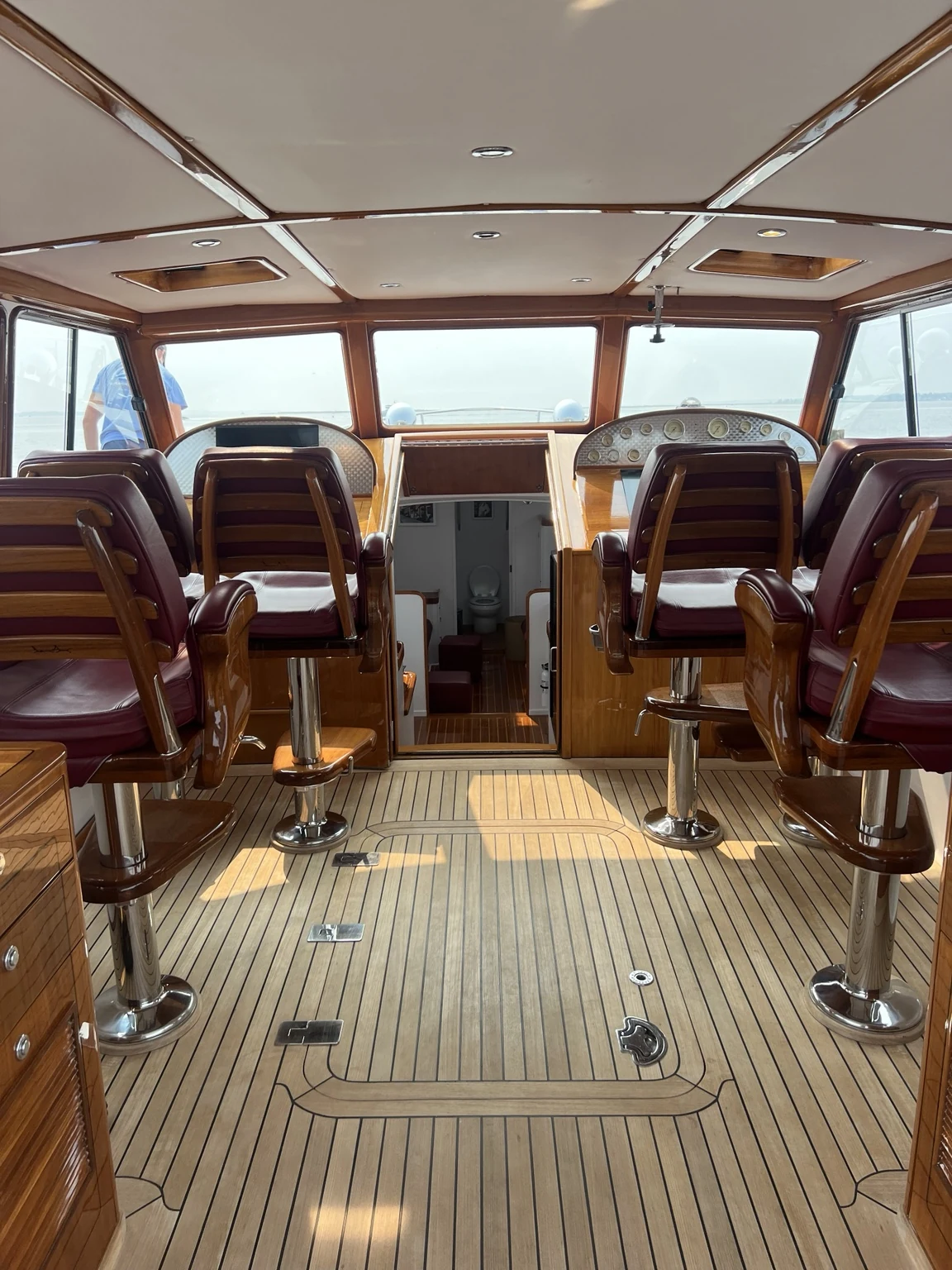 Cleaned cockpit interior with finished teak and woodwork