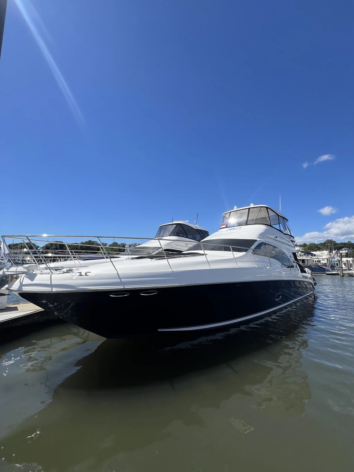 Dark-hulled cruiser with bright white superstructure