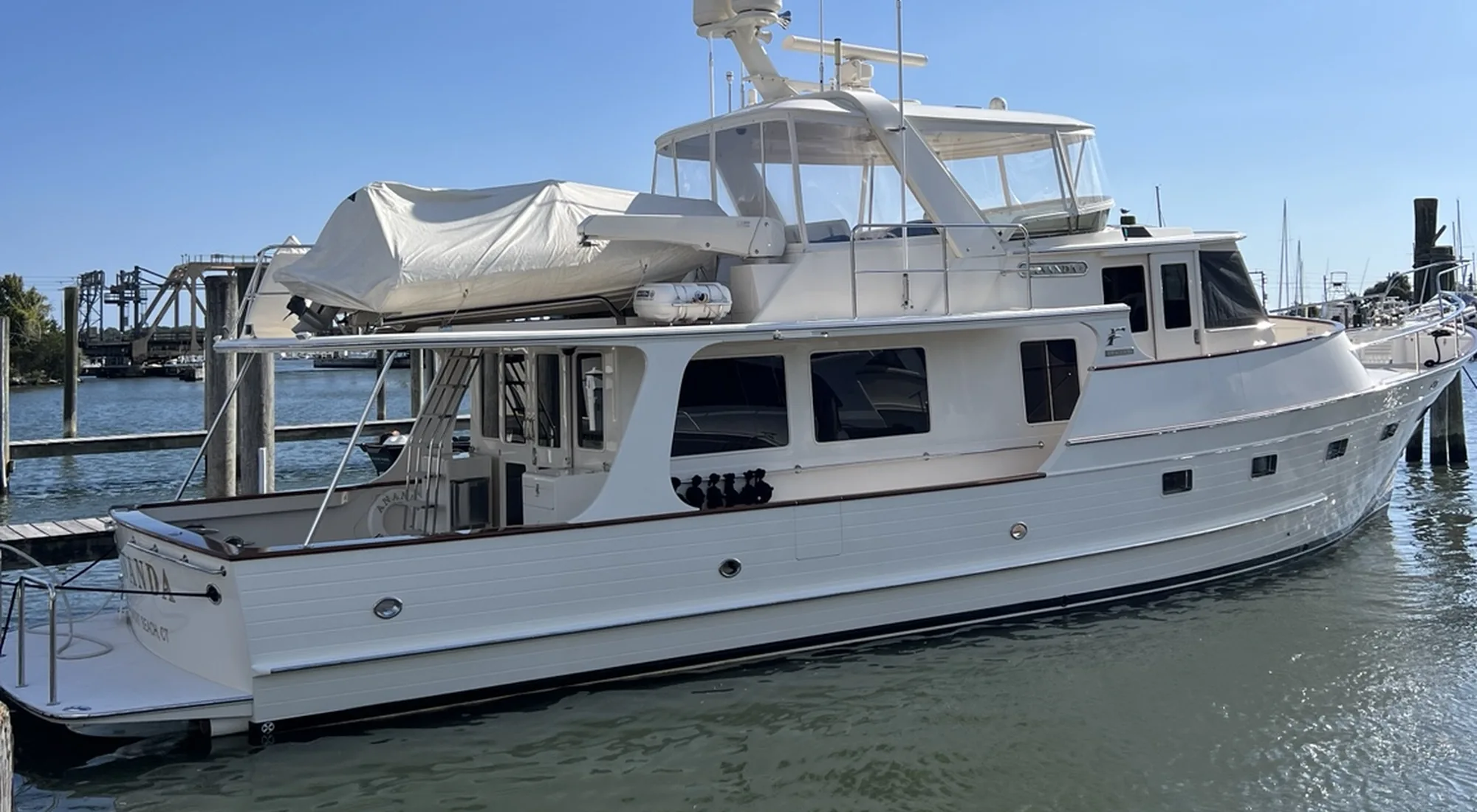 Large trawler yacht at a marina