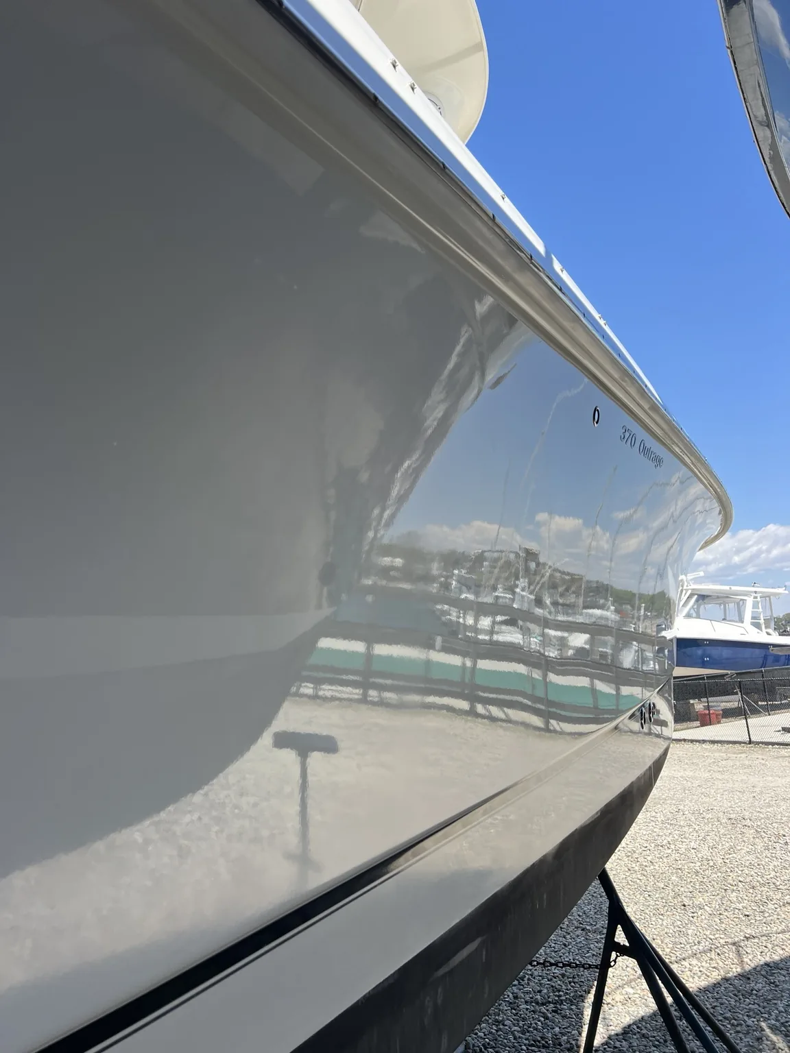 Highly reflective finish on a Boston Whaler 370 Outrage after polishing