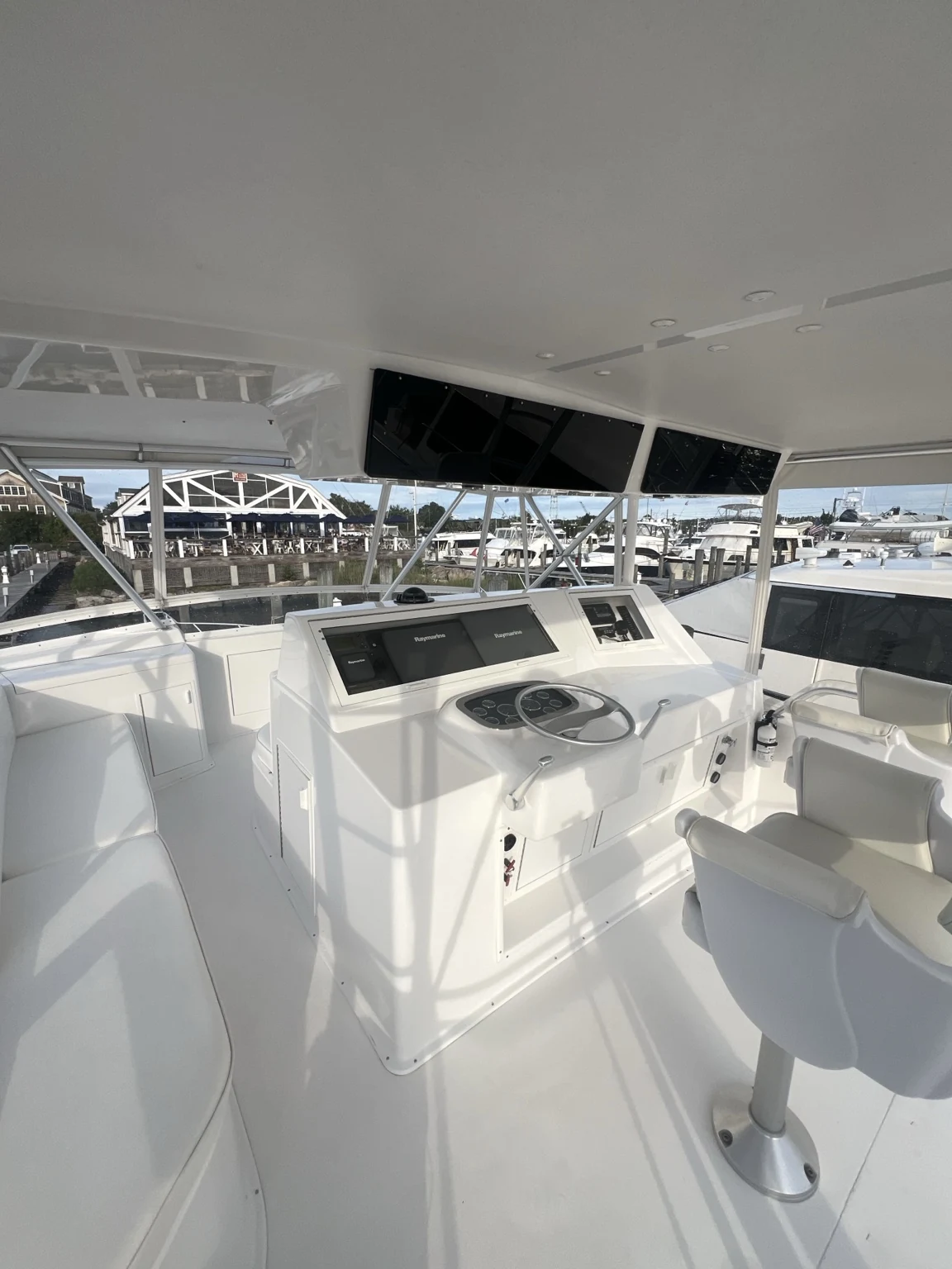 Detailed Viking flybridge with clear isinglass and cleaned metal surfaces