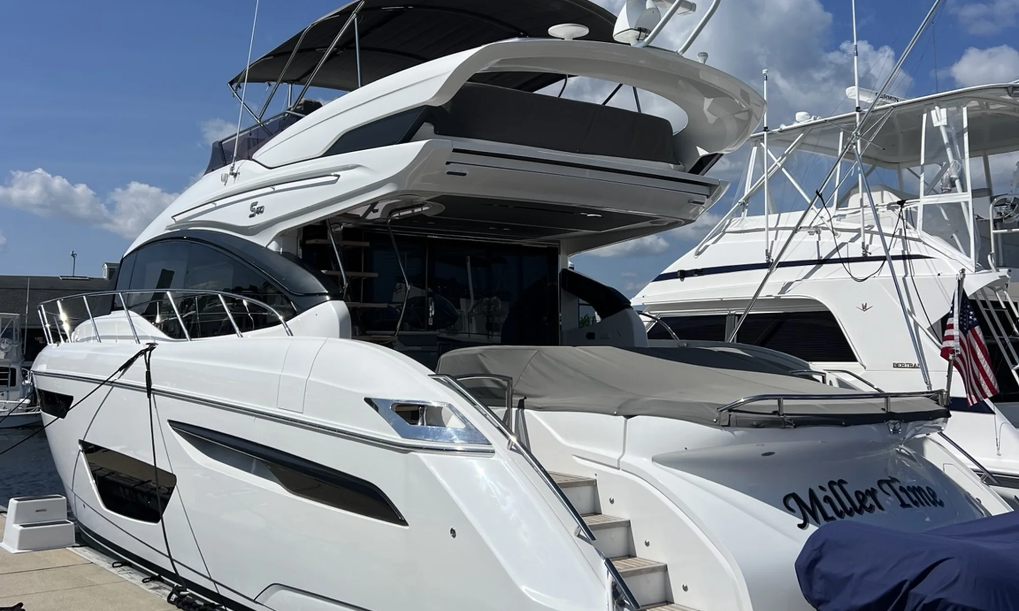 Finished modern motor yacht at a marina